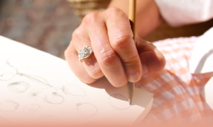 hands with several unique silver rings